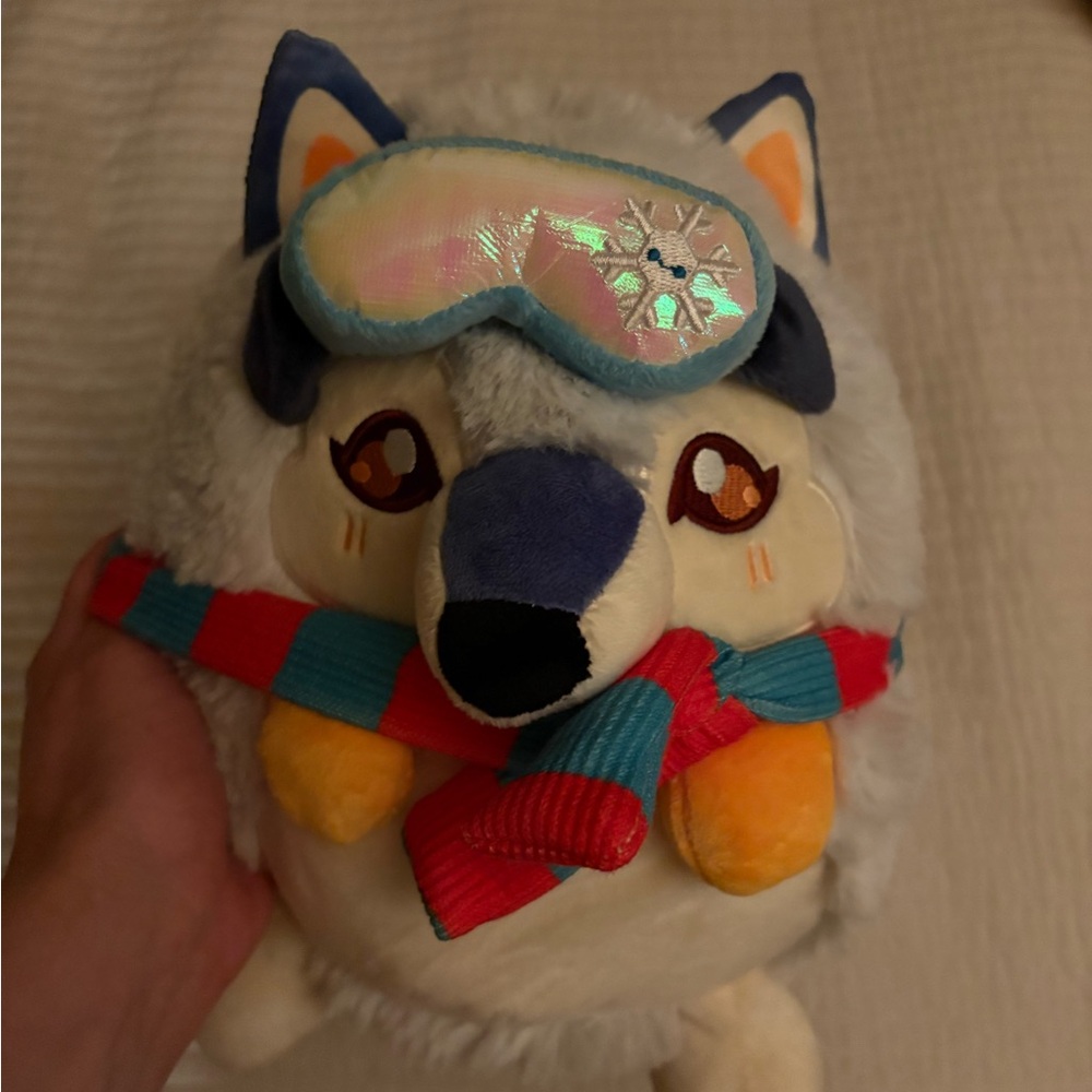 Plush Stuffed Animal with Blue and Red Accents